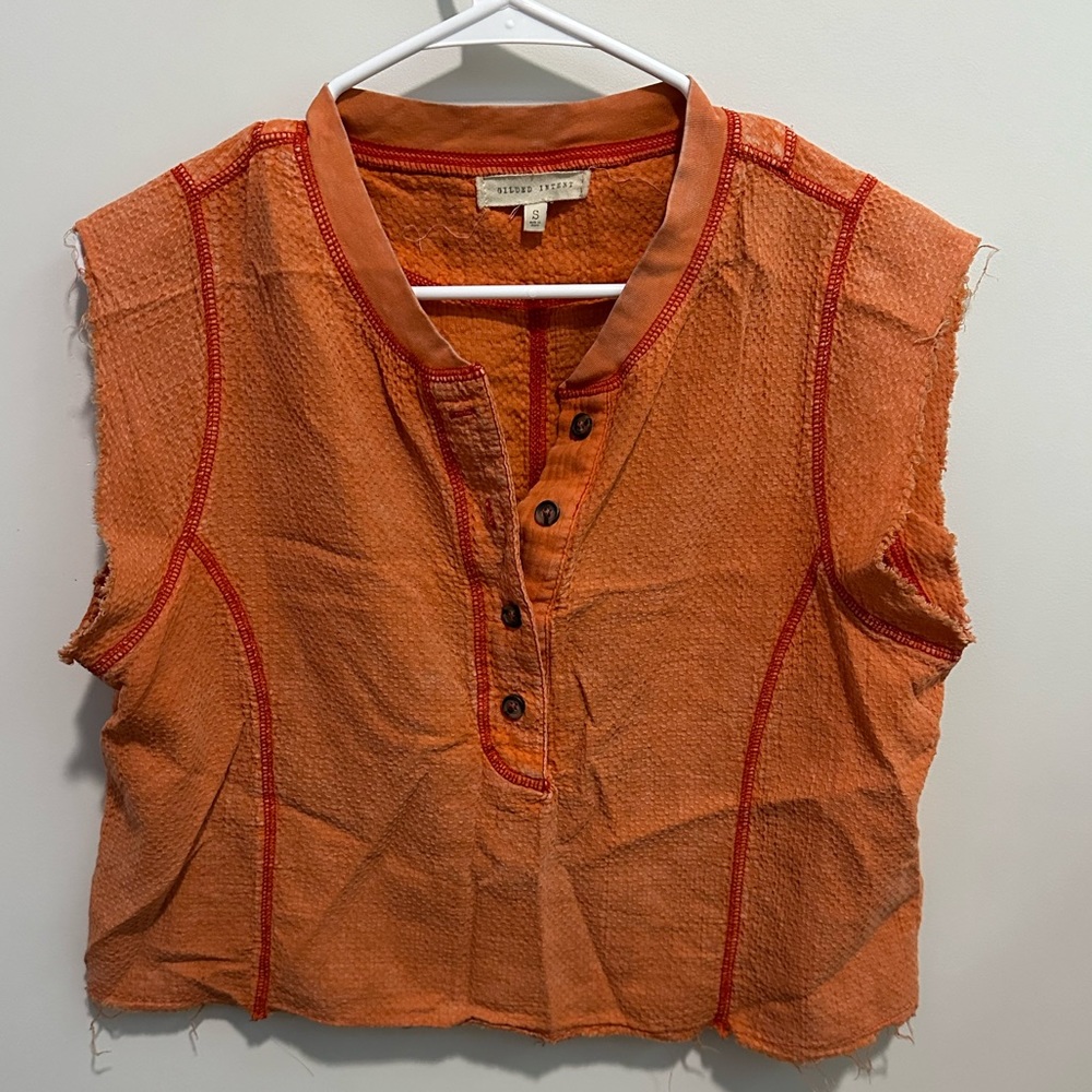 Size small orange shirt